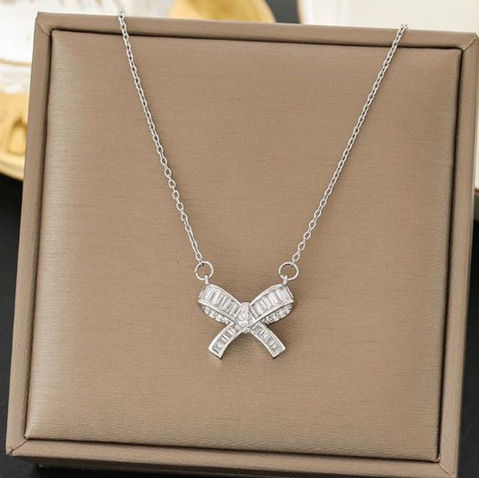 Silver/ Gold/ Rose Gold Elegant Silver Bow Pendant Necklace with Sparkling Gemstones – A Timeless Symbol of Grace and Sophistication
